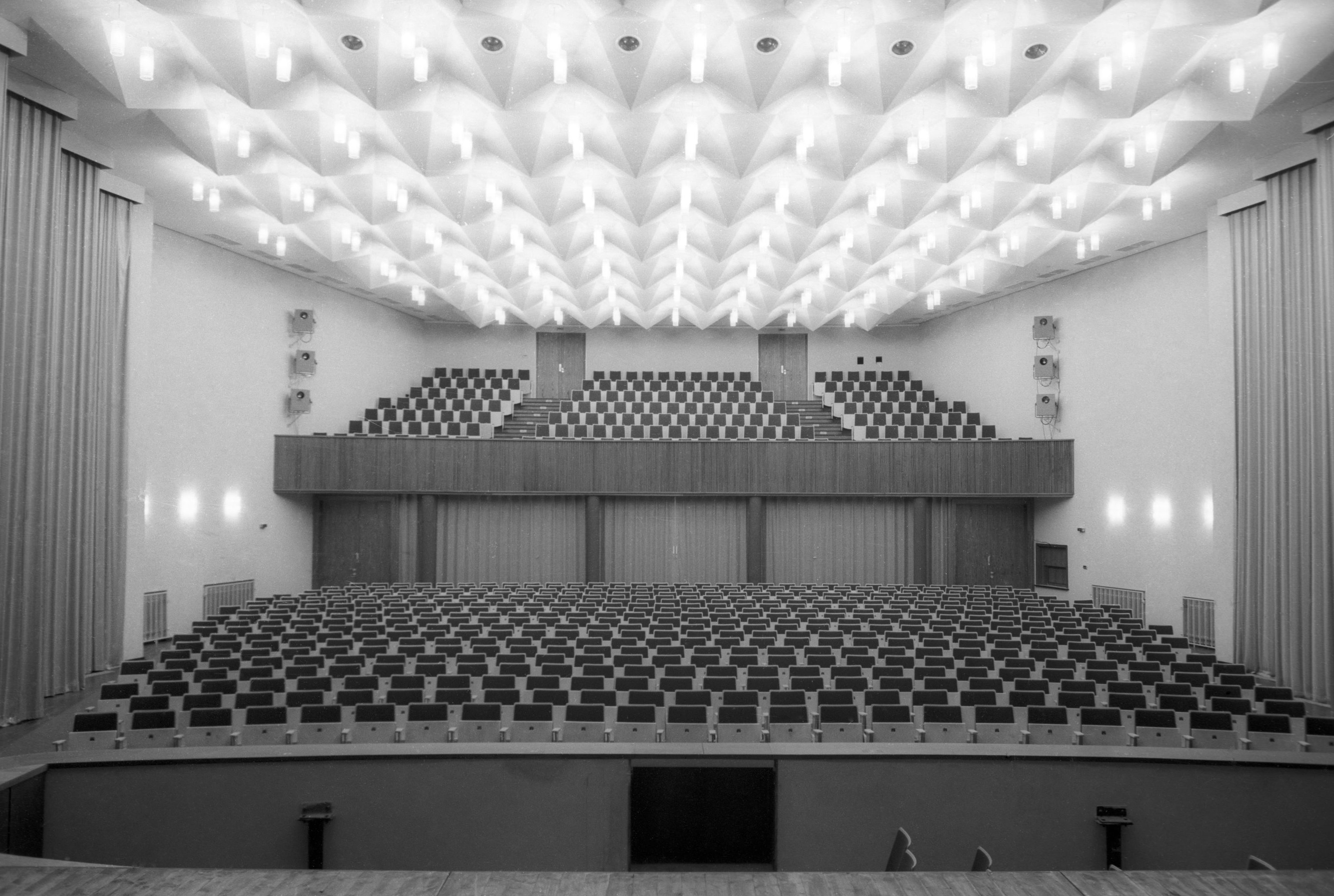 View from the stage onto the empty rows of stands in the Stadthalle Wattenscheid. Black and white photo